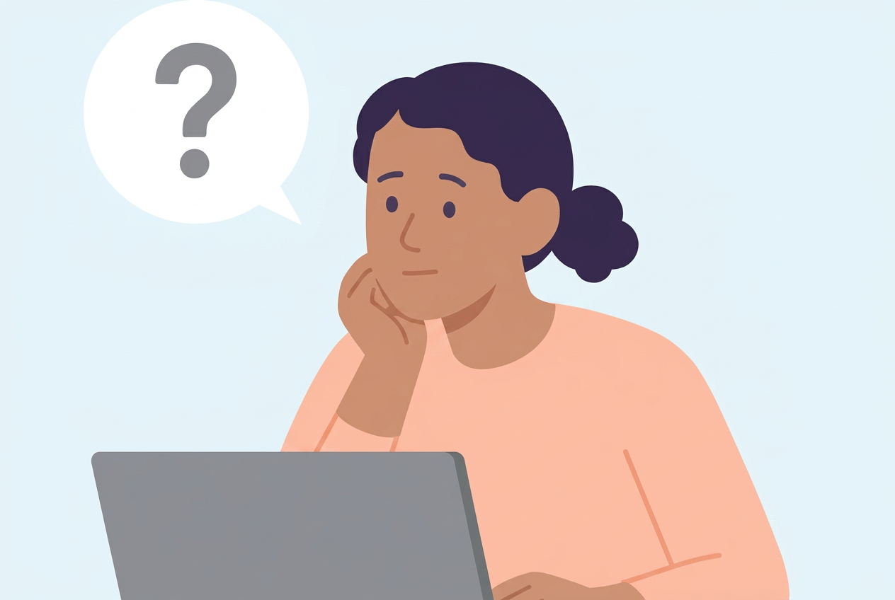 Woman thinking at a laptop